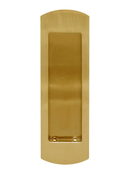 Rounded End Pocket-Door Flush Pull in Aged Brass.